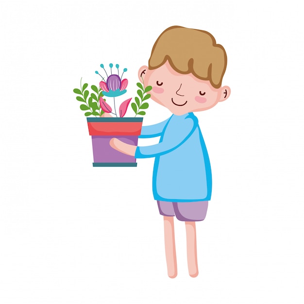 Little boy lifting houseplant