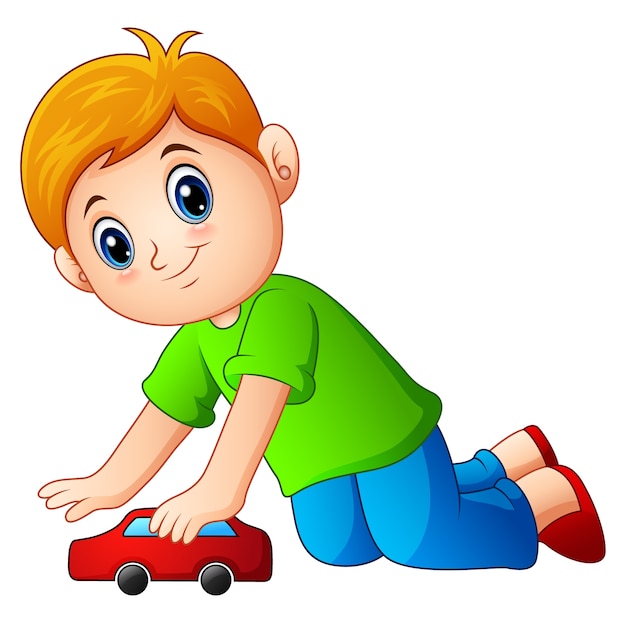 Little boy playing a toy car