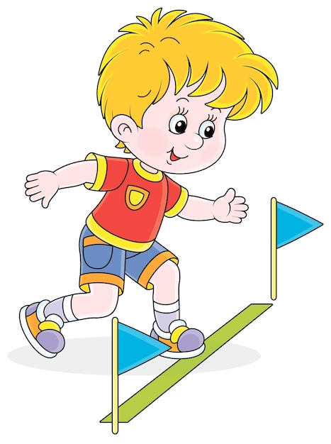 Little boy at the start of a running race at an athletics competition on a sports ground