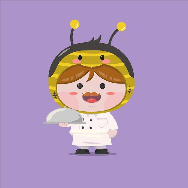 A little boy wearing chef bee costume