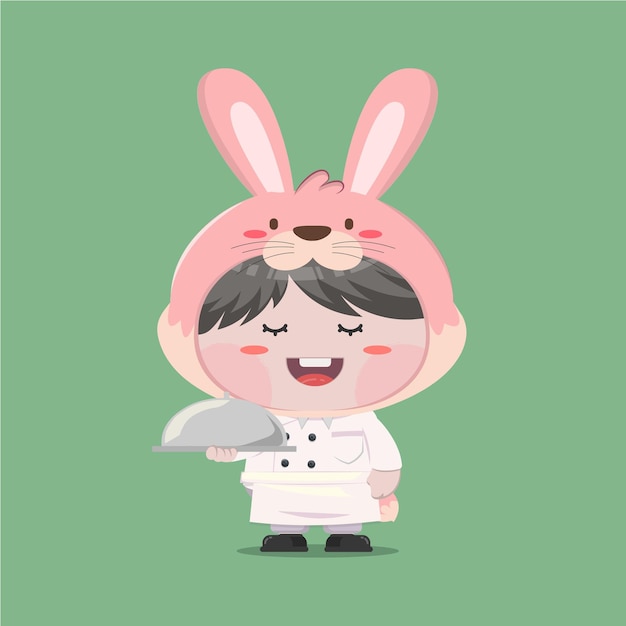 A little boy wearing chef rabbit costume