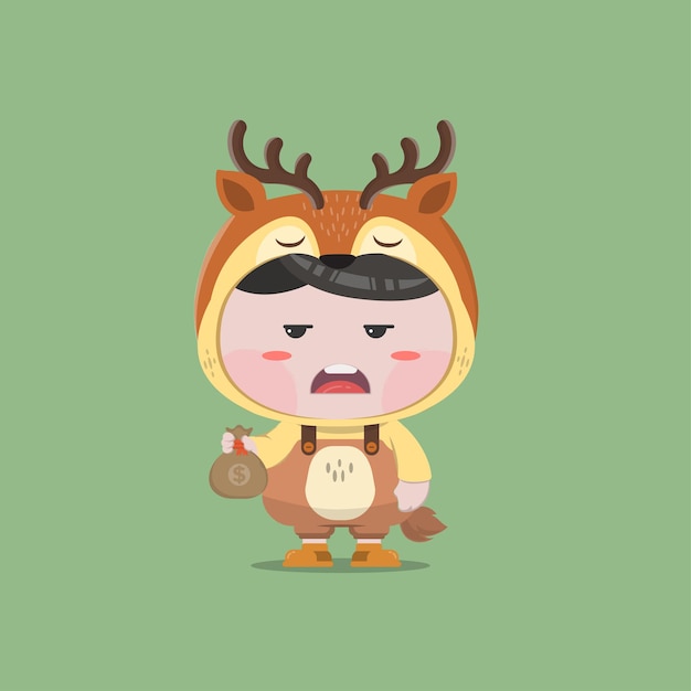 A little boy wearing deer animal costume