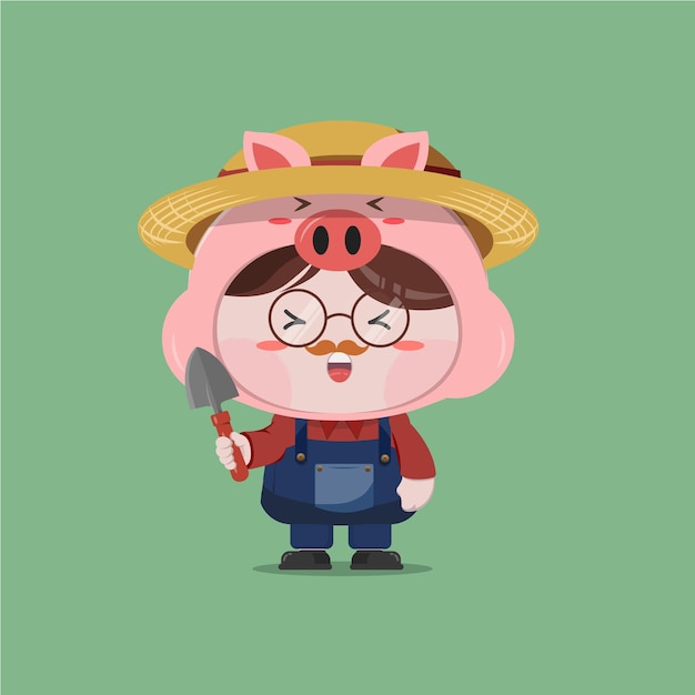 A little boy wearing farmer pig costume