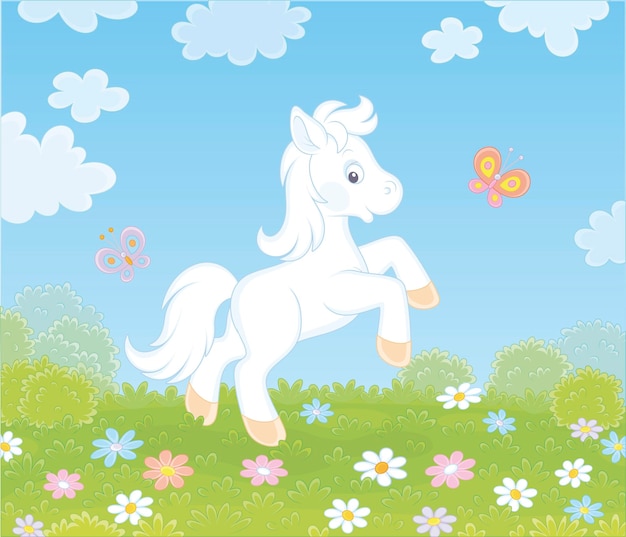 Little white pony dancing with funny butterflies among colorful flowers on green grass of a meadow