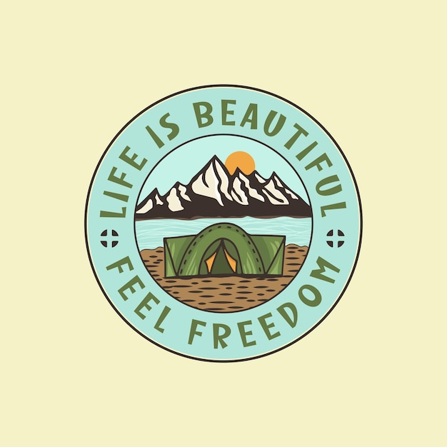 A logo for a tent and mountains with the words life is beautiful feel freedom.