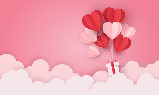 Love heart balloon and gift flying over cloud. valentine's day greeting card posters and wallpaper.