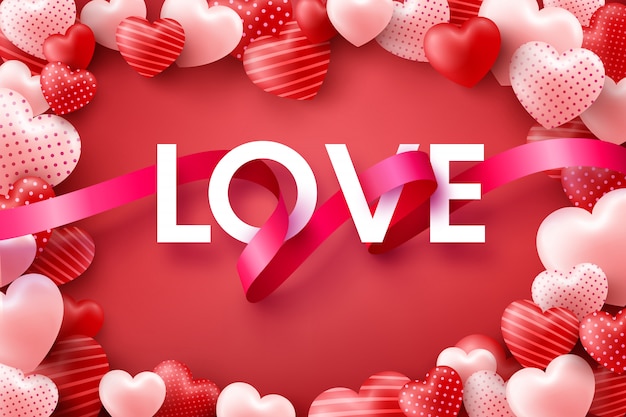 Love and Valentine's Day background with word "LOVE" ribbon and sweet hearts on pink