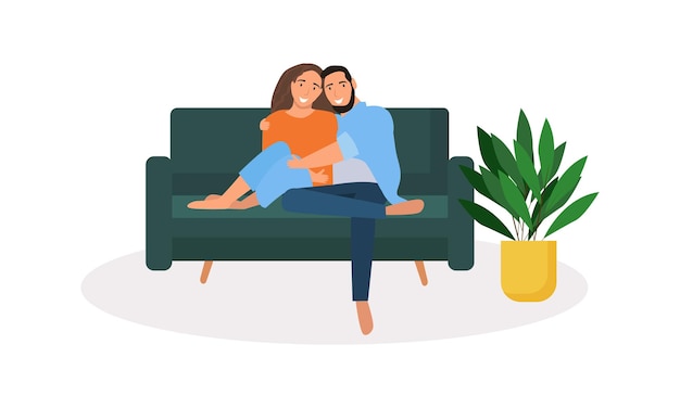 Loving family couple sitting on the couch. Lovers hug each other isolated on a white background.