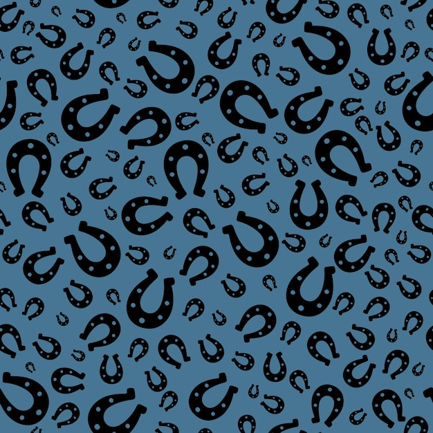 Lucky horseshoes silhouettes seamless vector pattern on blue background