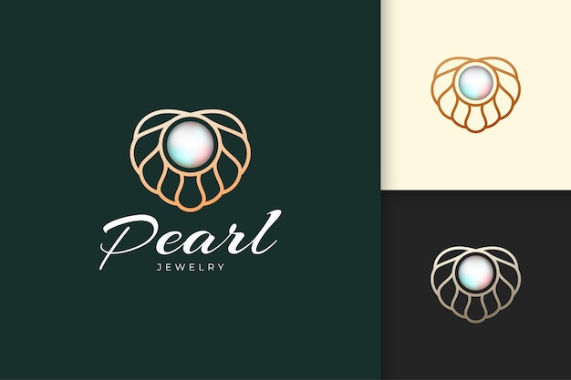 Luxury and elegant pearl logo with seashell or scallop represent jewelry and gem