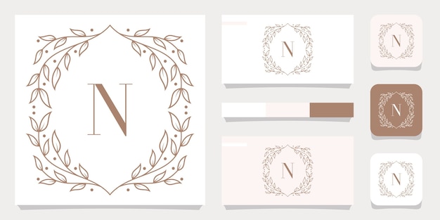 Luxury letter N logo design with floral frame template, business card design