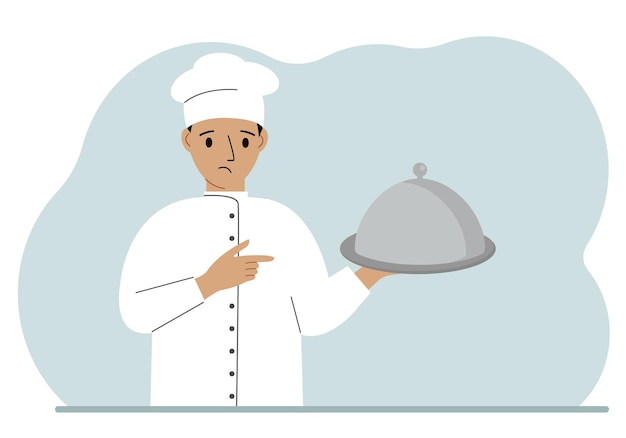 A male chef with a plate covered with a cloche or a tray with a lid