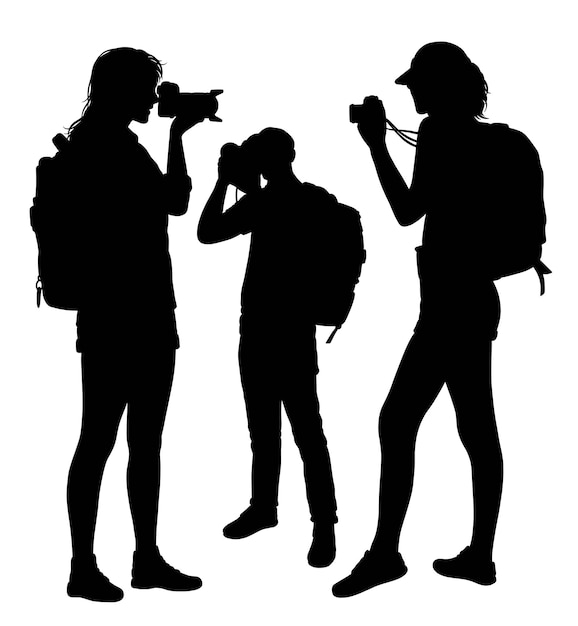 Male and female photographer. Traveller pose silhouette