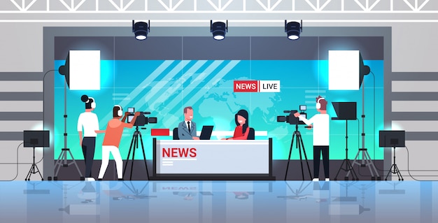 male presenter interviewing woman in television studio tv live news show video camera shooting crew broadcasting concept flat full length horizontal