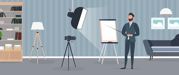 A man in a business suit with a tie is giving a presentation to the camera.