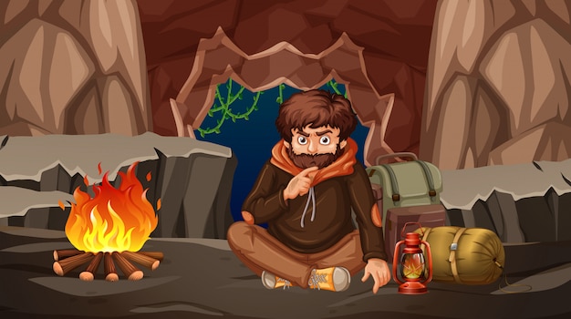 A man camping in a cave