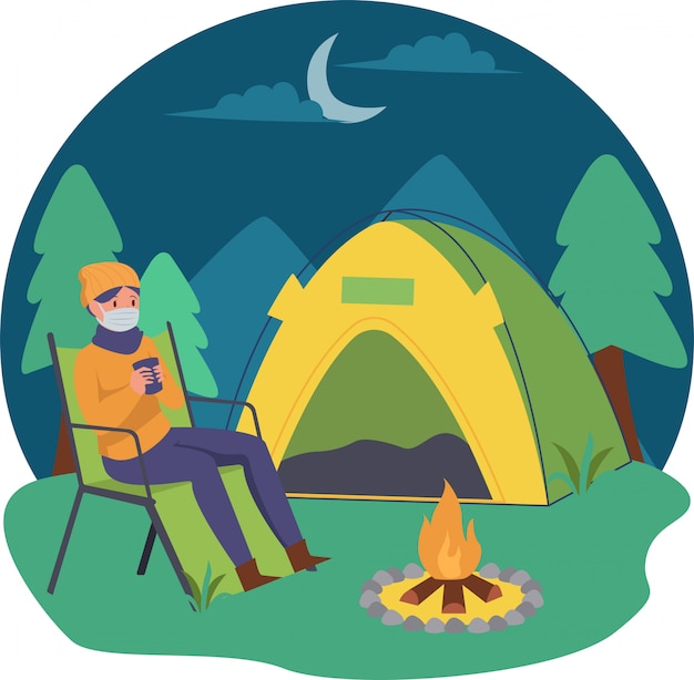 A man enjoying hot drink while camping alone