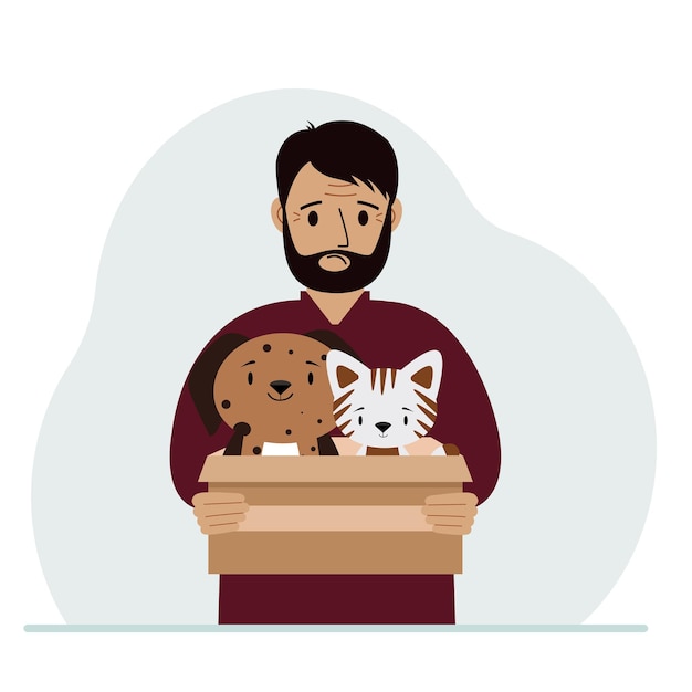 A man holds a cardboard box with a cat and a dog The concept of rescue help and care for pets