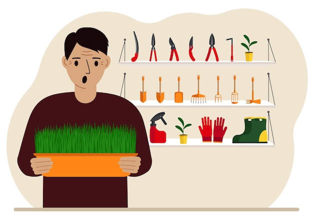 A man holds a plant in his hands against the background of gardening tools Gardening concept