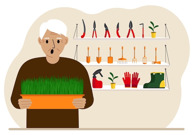 A man holds a plant in his hands against the background of gardening tools Gardening concept