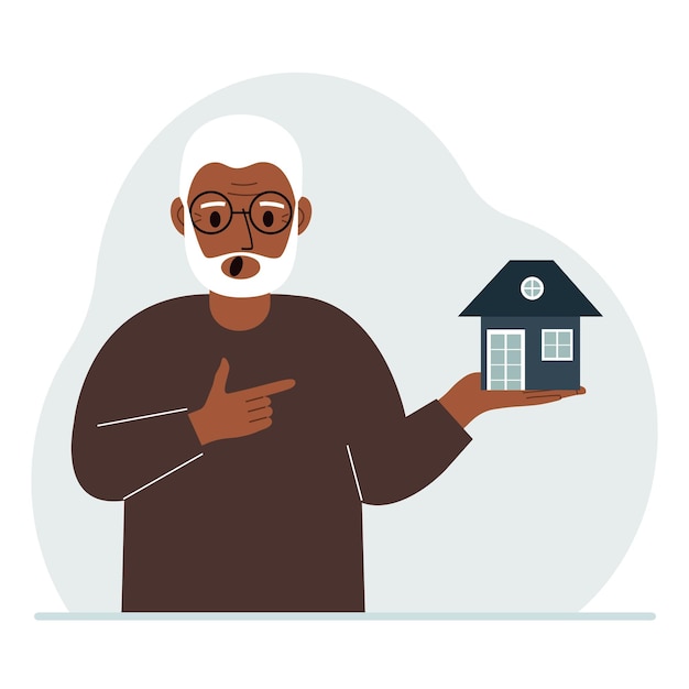 A man holds a small house in his palm Concepts of inheritance real estate transfer mortgage credit loan or house purchase