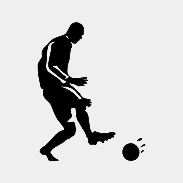 A man kicks a ball with the word soccer on it.