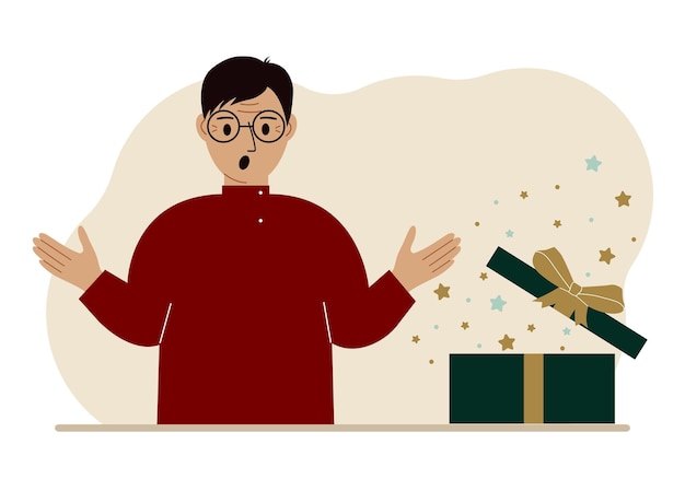 A man next to an open gift The concept of a holiday surprise promotion discount