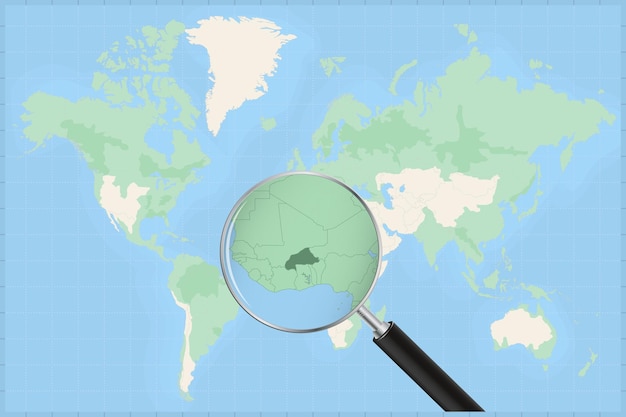 Map of the world with a magnifying glass on a map of Burkina Faso.