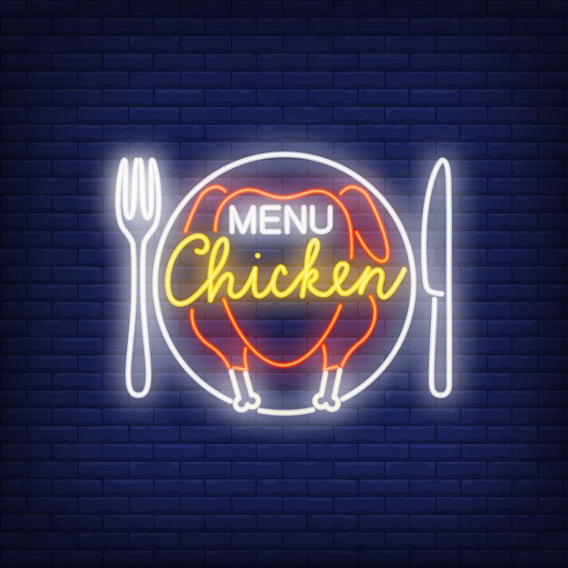 Menu chicken neon sign. Fried chicken meat on plate with fork and knife brick wall.