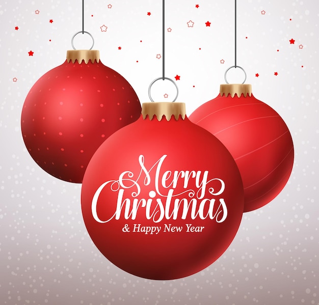 Merry christmas typography greetings in a hanging red christmas balls in a snow white background