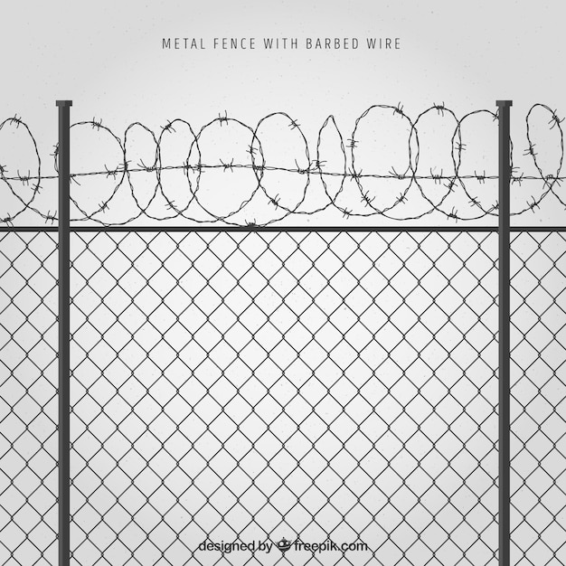 Metal fence with barbed wire on gray background