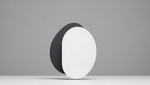 Vector a minimalist image of two white oval shapes one behind the other set against a gray background representing a simple and geometric design