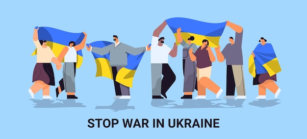 Mix race people protesters holding Ukrainian flags pray for Ukraine peace save Ukraine from russia stop war concept