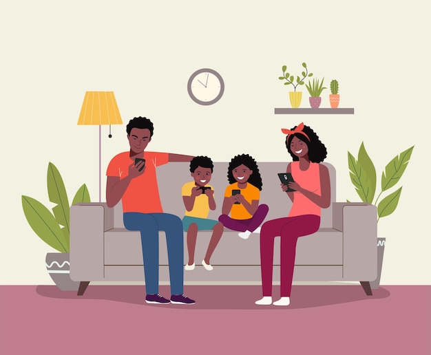 Mother and father with children sitting on the sofa with smartphones.