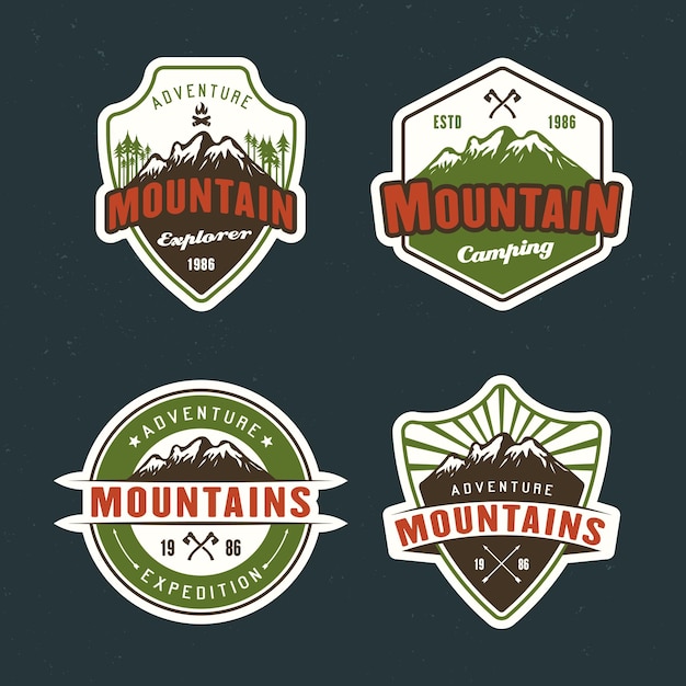 Mountain travel and outdoor adventure set of vector colored emblems stickers labels badges and logos