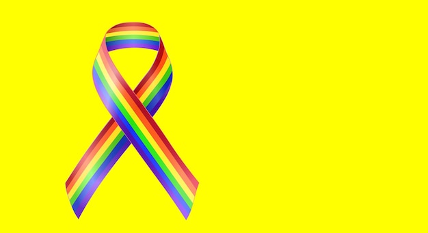 Multicolored ribbon, rainbow colors, symbol, awareness, on a yellow background. Copy space. Vector illustration