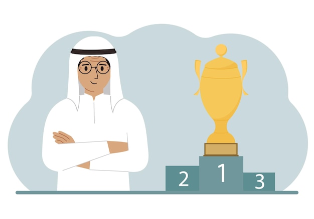 A muslim man next to the pedestal on which the cup for victory and first place