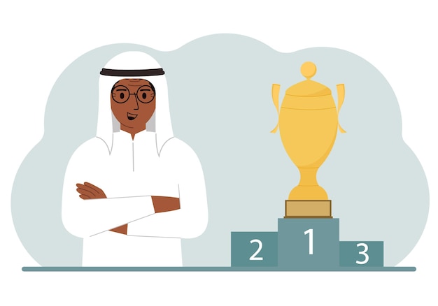 A muslim man next to the pedestal on which the cup for victory and first place