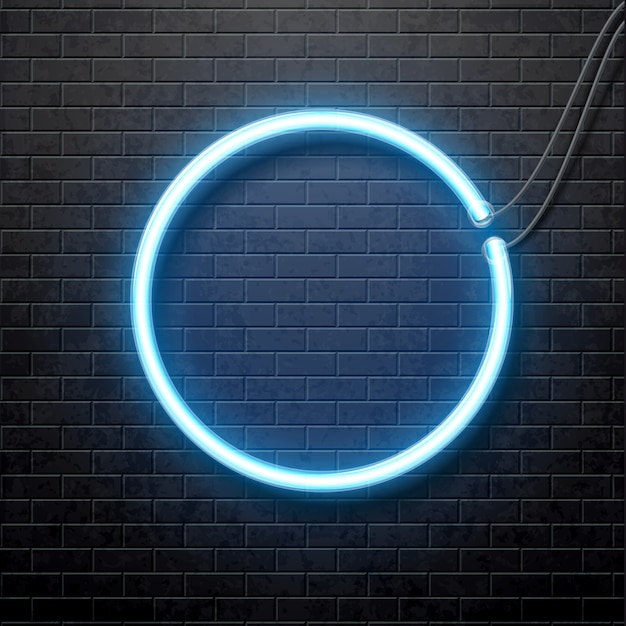 neon blue circle isolated on black brick wall