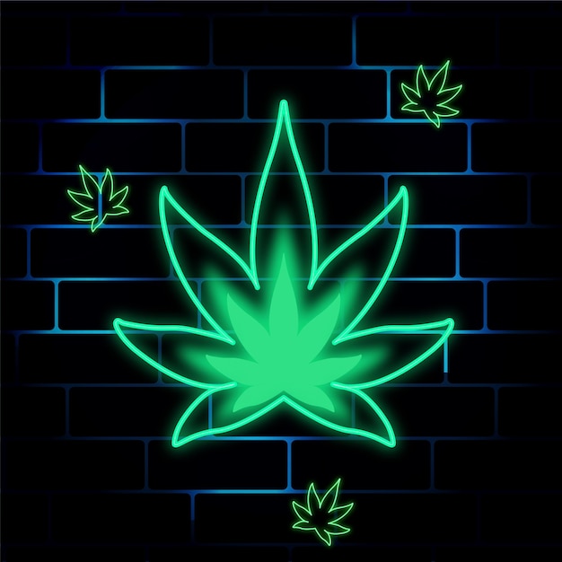 neon sign hemp leaves on a brick wall