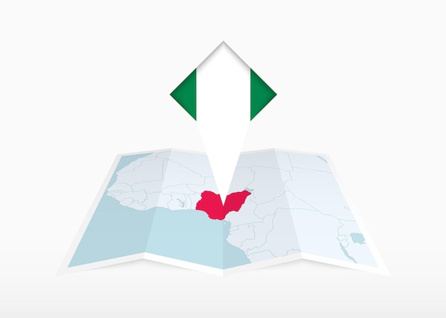 Nigeria is depicted on a folded paper map and pinned location marker with flag of Nigeria.