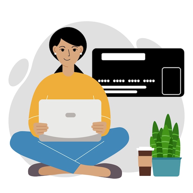 Online payment concept. Close up of a large credit card. A woman sits cross-legged, holding a laptop in his hand.