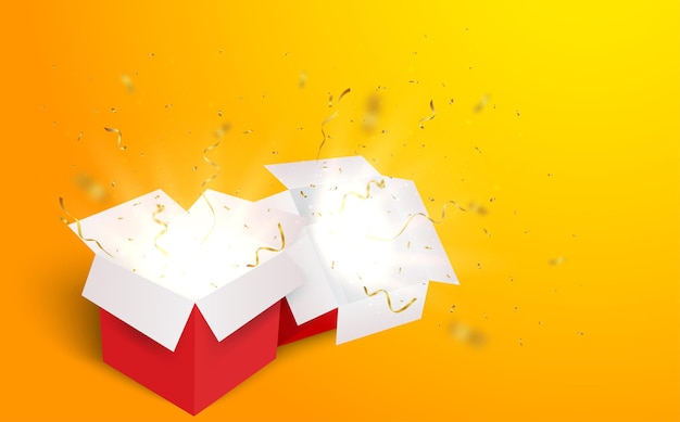 Open box with gold and red confetti  isolated  