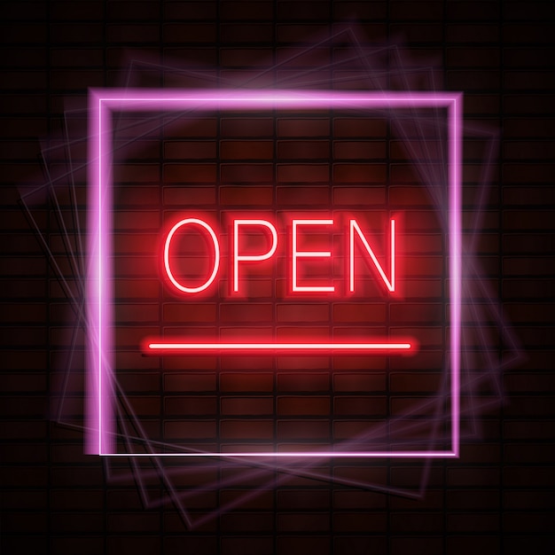 Open neon sign on brick wall