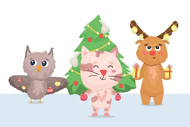 Owl, kitten and elk decorate the christmas tree