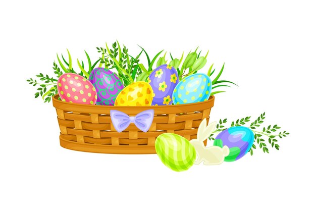 Vector painted or foiled easter eggs or paschal eggs rested in wicker basket in green grass vector illustration