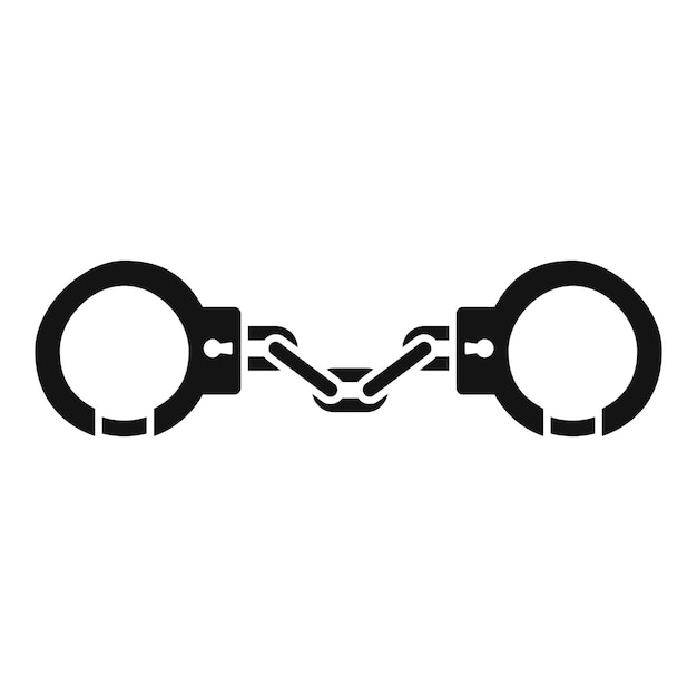 Pair of metal handcuffs restraining freedom