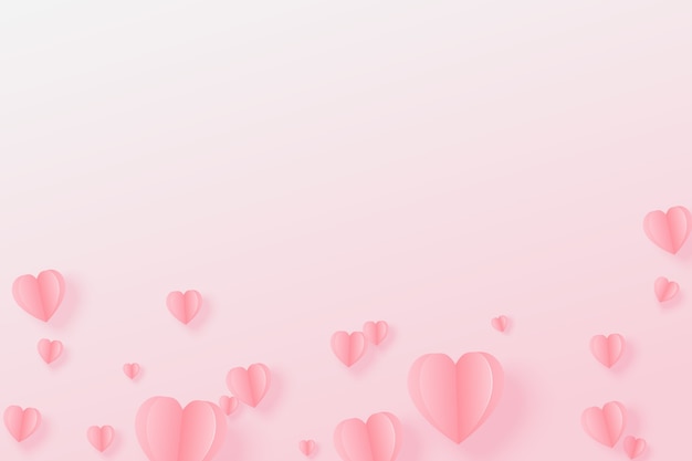 Paper elements in shape of heart flying on pink background