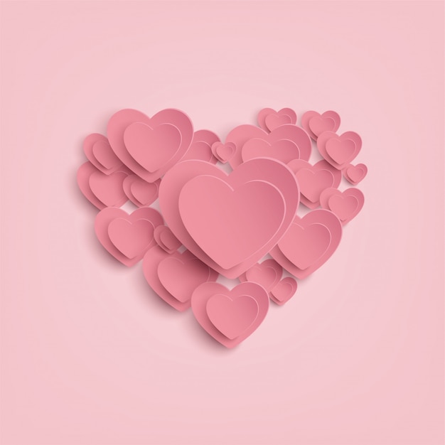 Paper heart on pink background