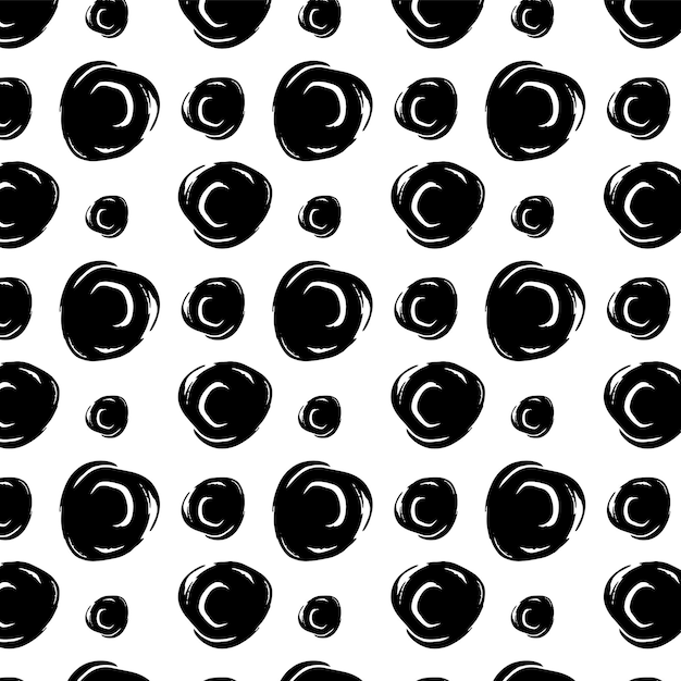 Pattern with circles of different size black on whiteHand drawn T